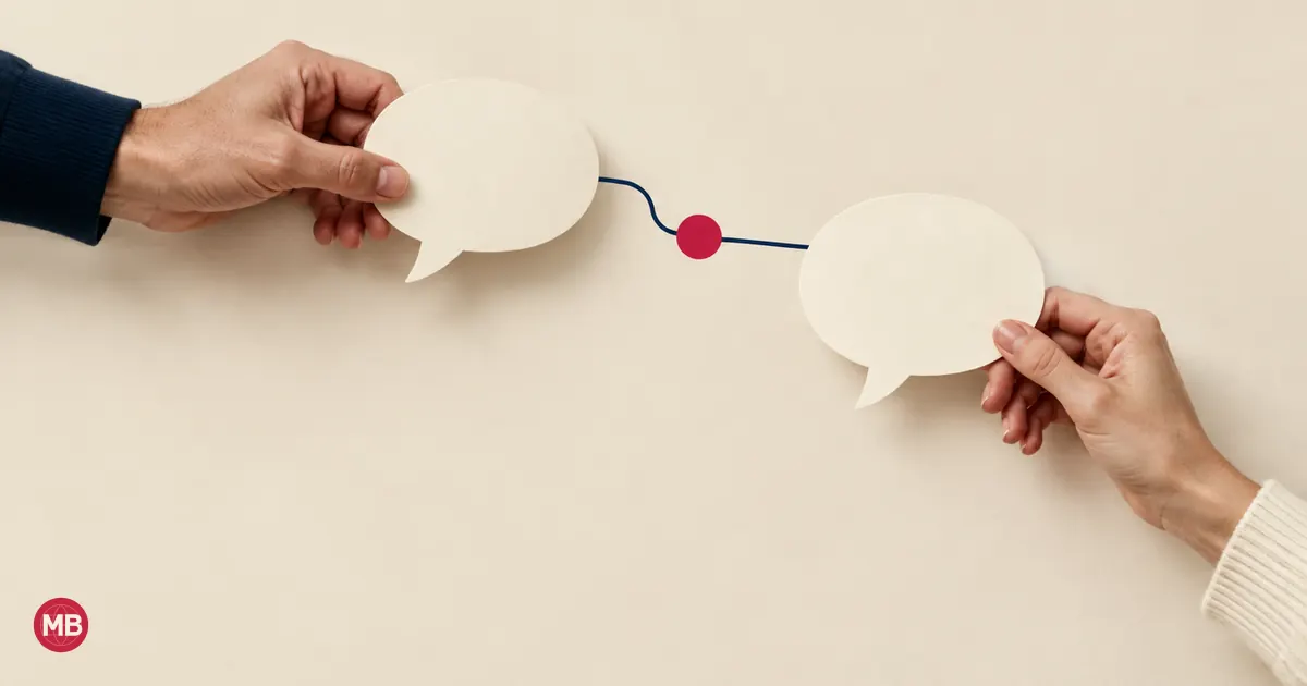Two hands holding speech bubbles joined by a navy line through a red node
